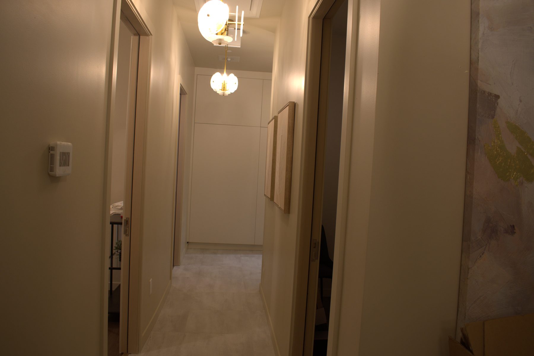Hallway renovation with modern lighting and minimalist decor — Leela Spa (Bankers Hall)