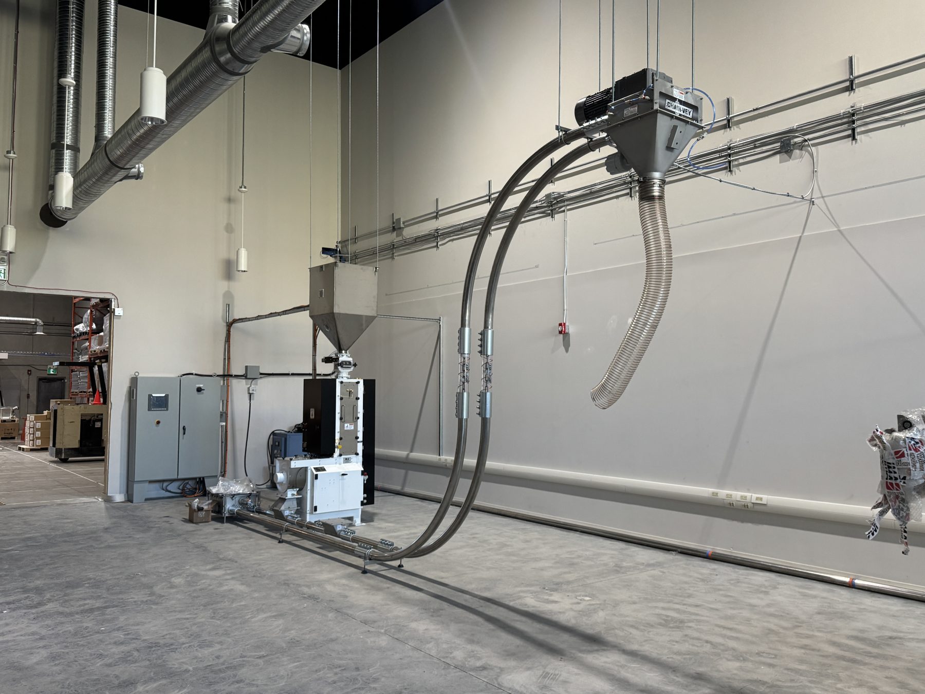 Industrial machine with flexible hoses and ventilation ducts installed — Eight Ounce Coffee