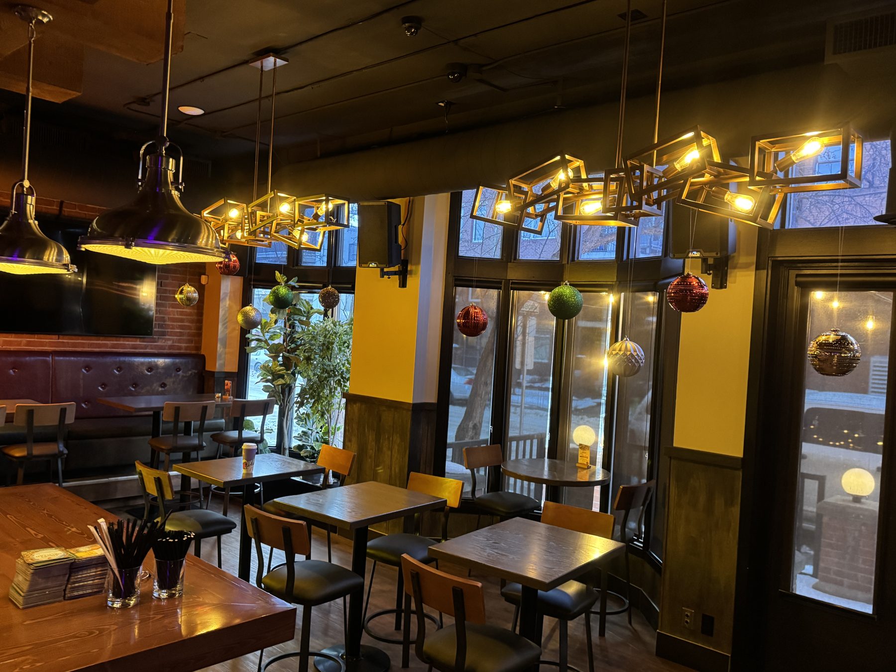 Modern dining room with geometric light fixtures and Christmas ornaments — Blowers and Grafton (Mission)