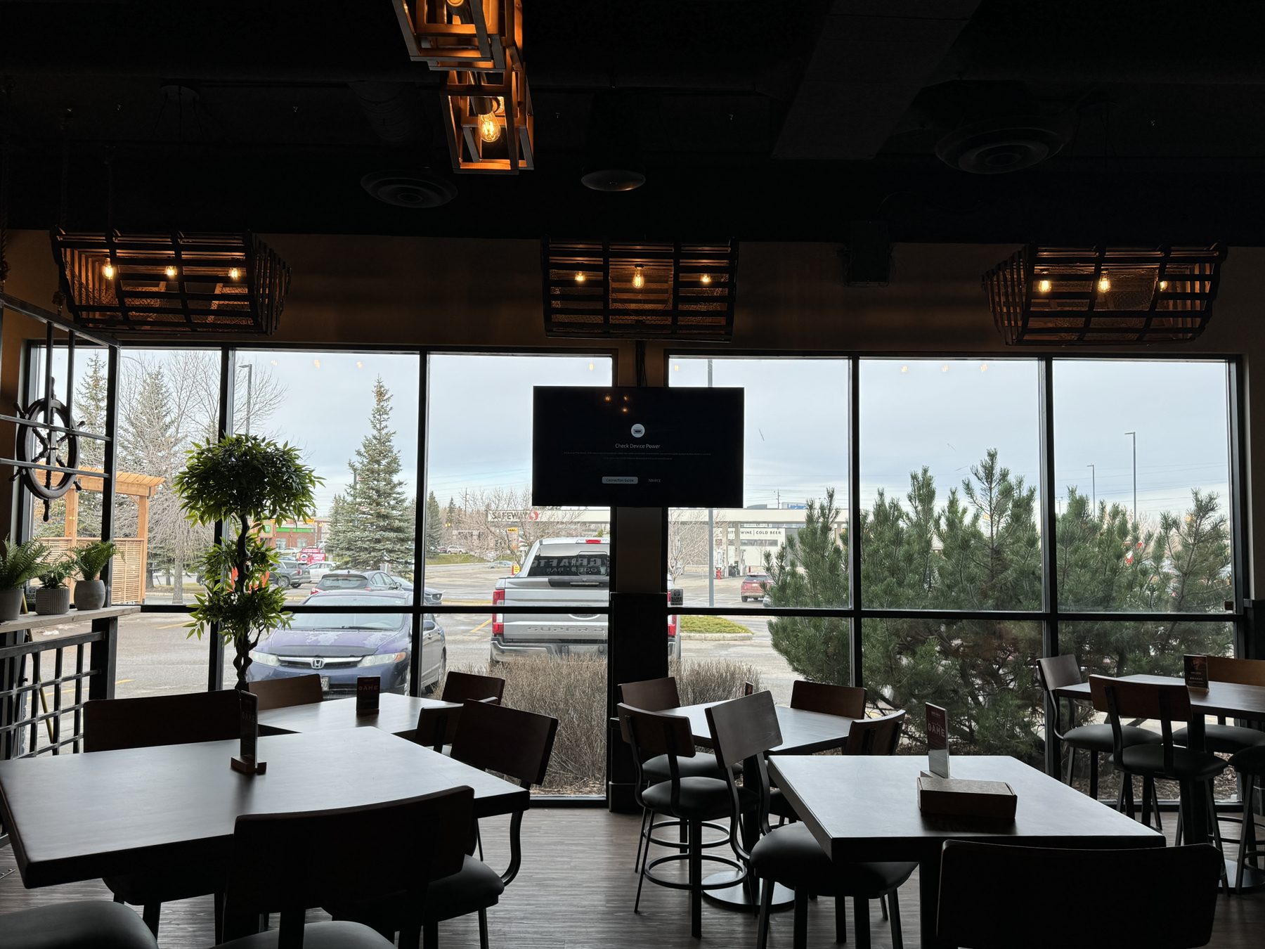 Restaurant interior with tables, chairs, and ceiling lights — Blowers and Grafton (Shawnessy)