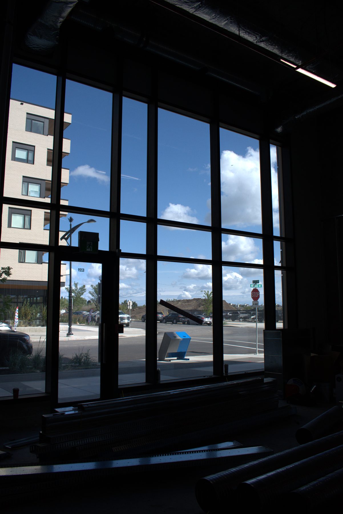 Interior construction with stacked metal framing and large windows — Leela Spa (West District)