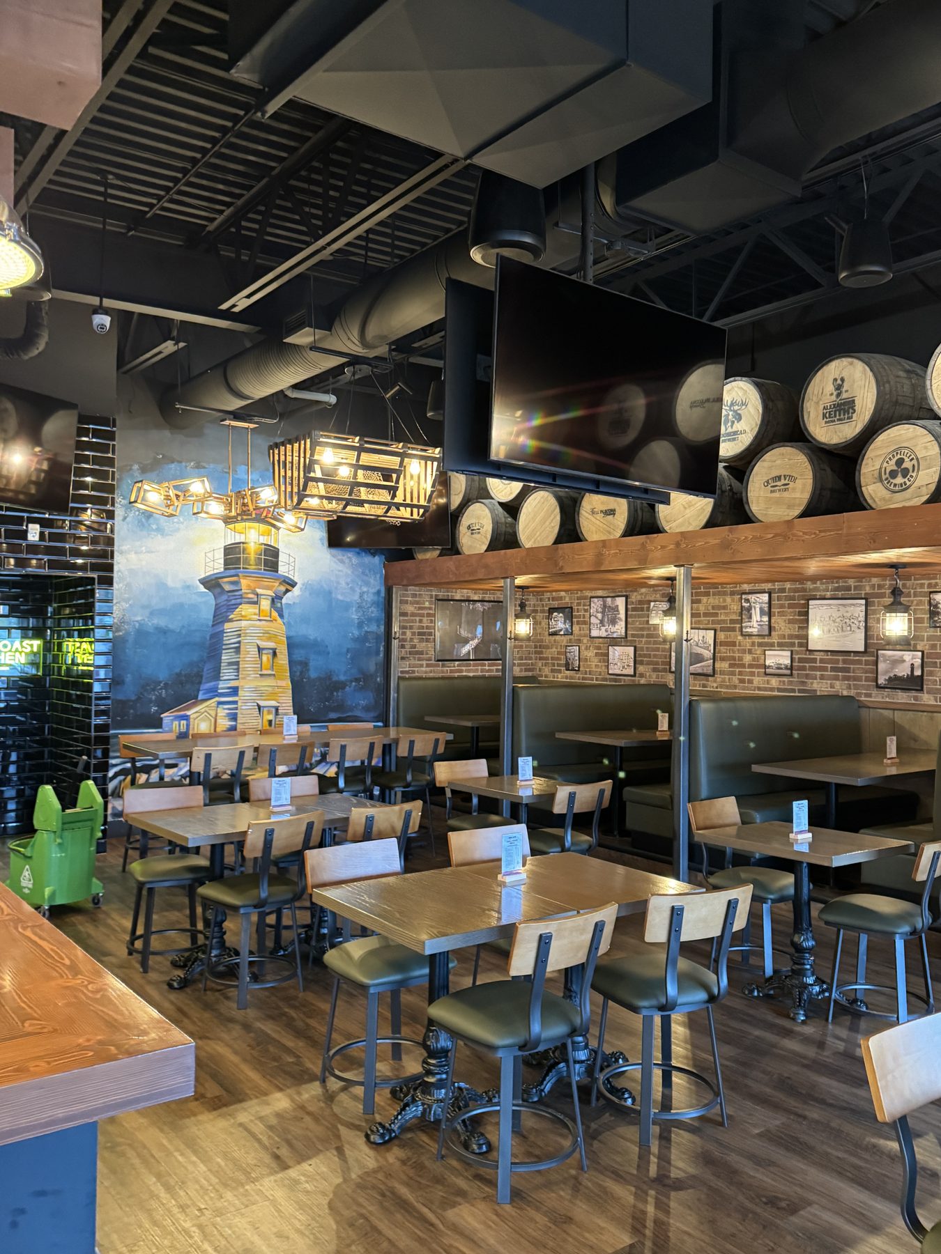 Restaurant dining area with tables, chairs, and booth seating — Blowers and Grafton (Lloydminster)
