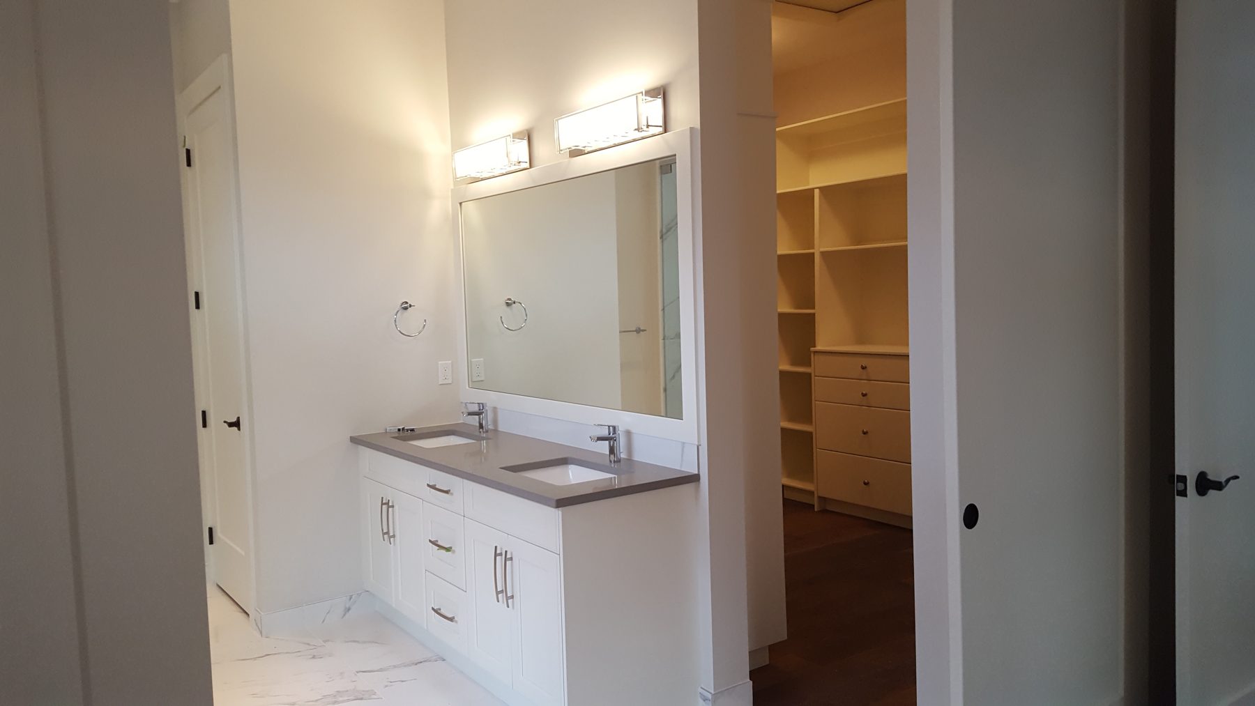 Master bathroom vanity and open closet shelving, work stage — Briar Hill