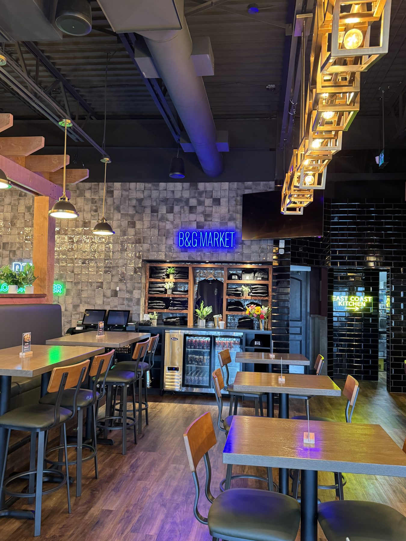 Restaurant interior with tables, bar, and merchandise display, under renovation — Blowers and Grafton (Lloydminster)