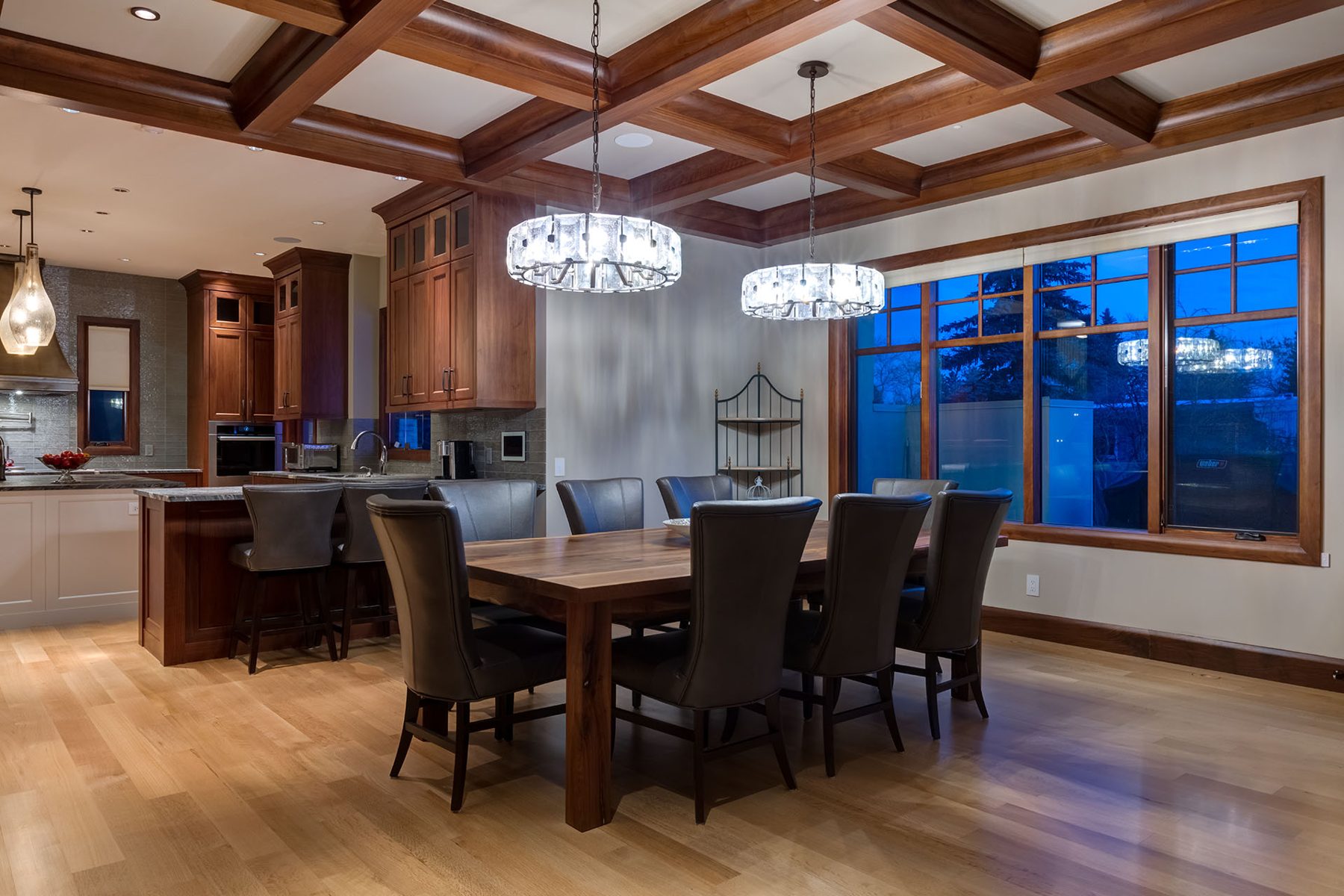 Dining room and kitchen area with wooden coffered ceiling and modern fixtures — Oxford