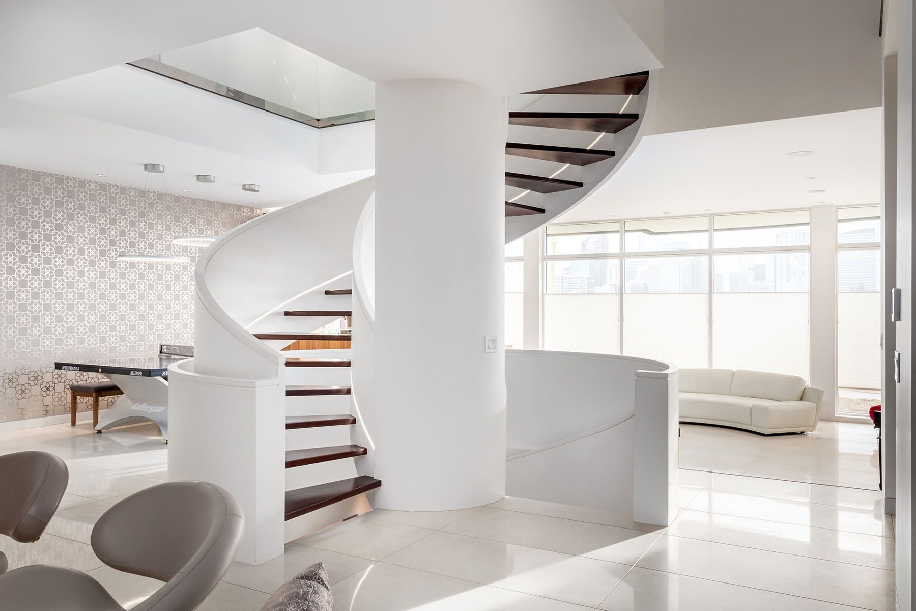 Modern spiral staircase with wood treads and white walls — Timeless Form