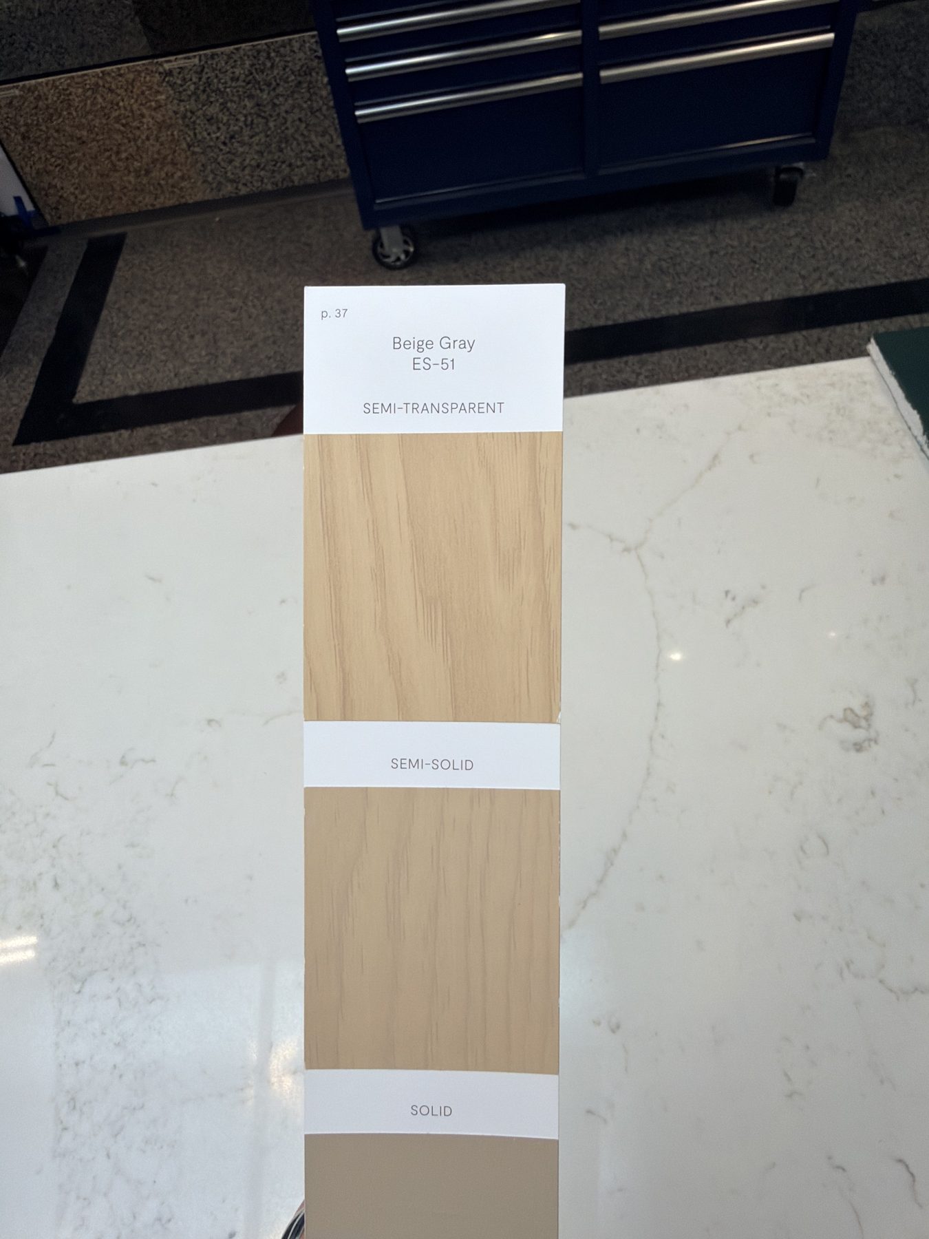 Beige Gray samples on countertop, tool chest in background — 3505 41 Street SW, Calgary