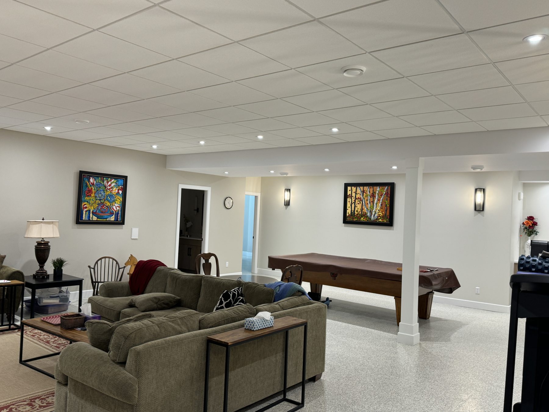 Newly renovated basement recreation room with sectional, pool table, and art — 18 Varsplain Place Northwest